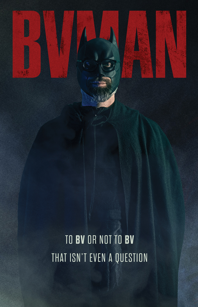 photo a man with glasses dressed up as batman
