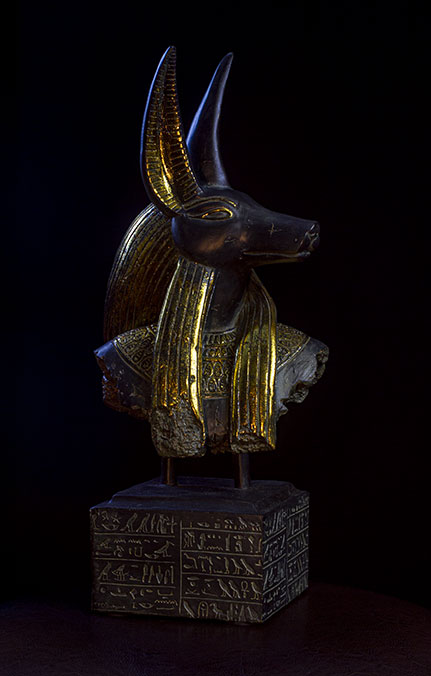 photo of an Anubis statue against a black background